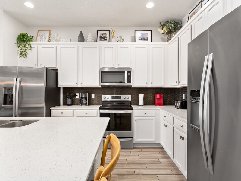 Fully equipped kitchens featuring stainless steel appliances and everything you need to prepare delicious meals for the day.