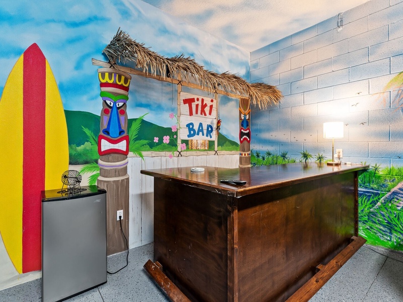 In need of more entertainment? There is a Tiki Bar themed game room!