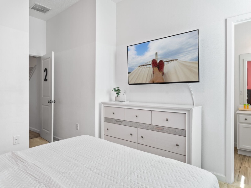 Our second bedroom features a queen size bed, its own TV and full private bathroom.