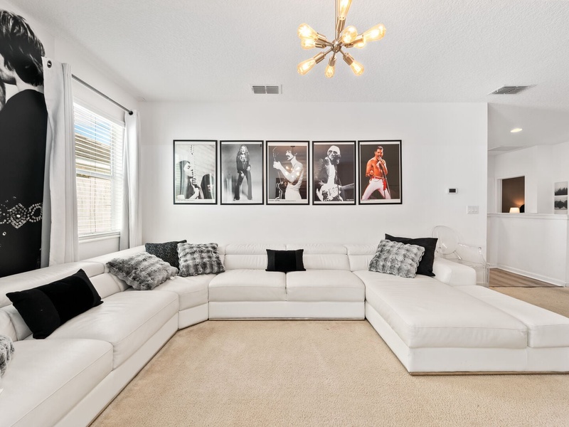 Enjoy a cozy movie night with ample plush seating designed for your comfort.