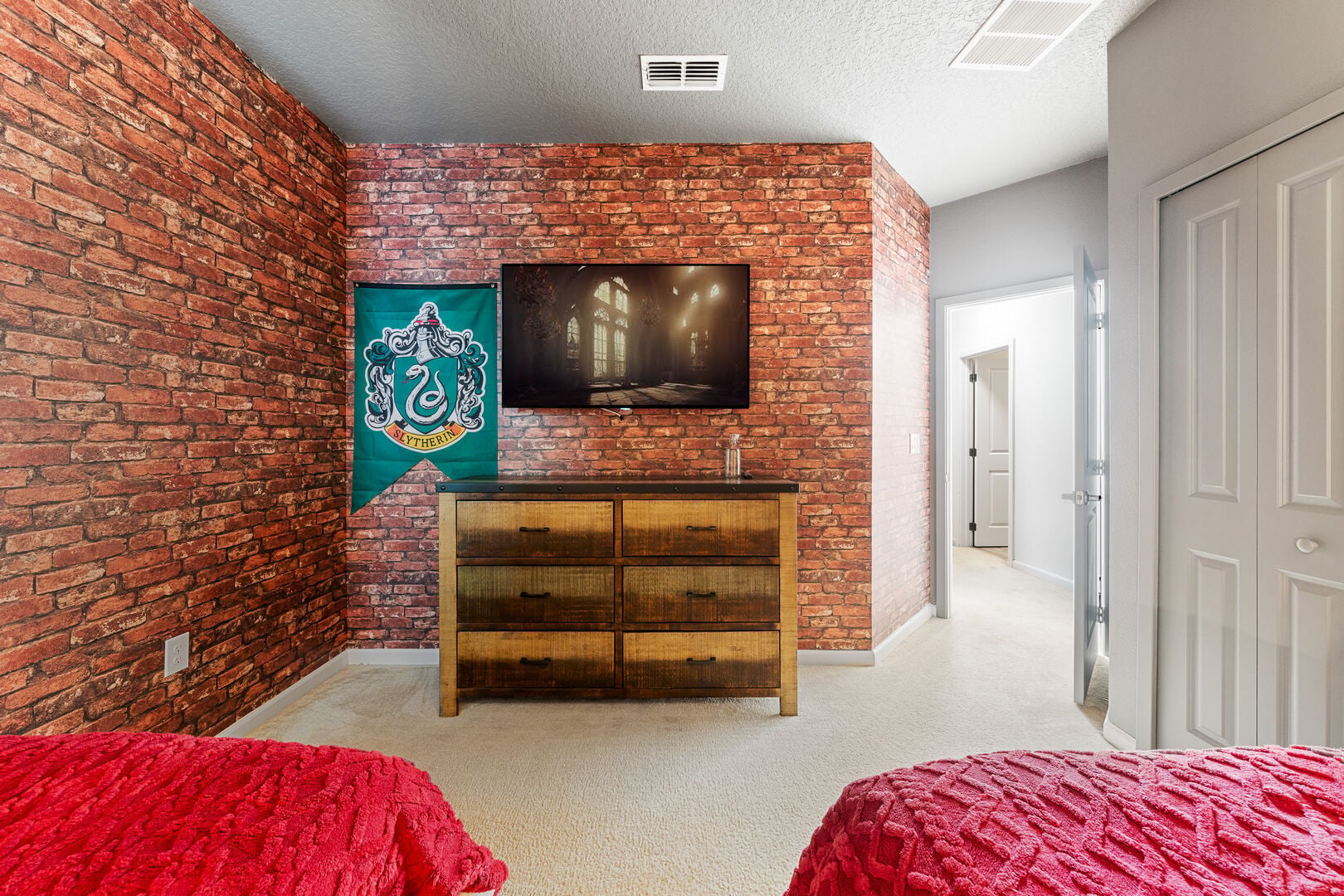 Featuring its own TV and a full shared bathroom.