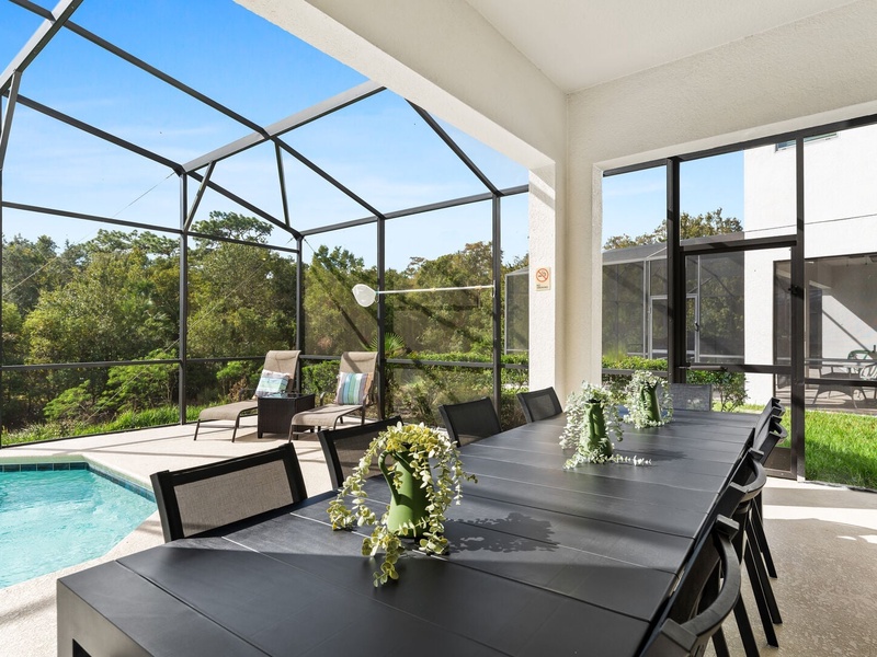 Enjoy delicious meals outside by the pool.