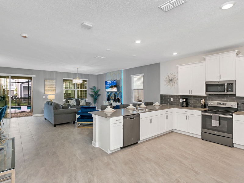The house perfectly integrates the kitchen, dining area and living room, making it perfect for large groups to socialize.