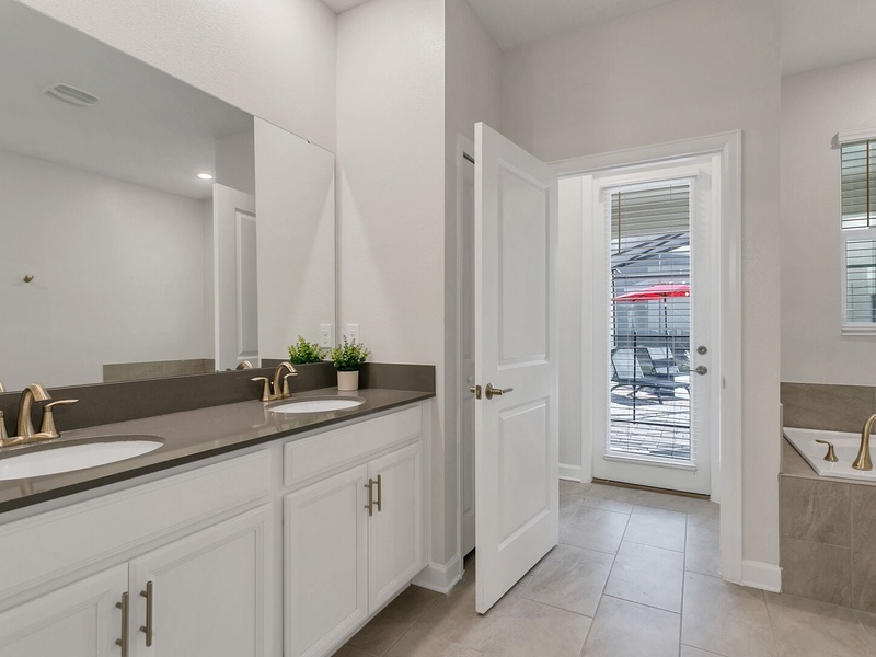 The master bedroom has its own access to the private pool.