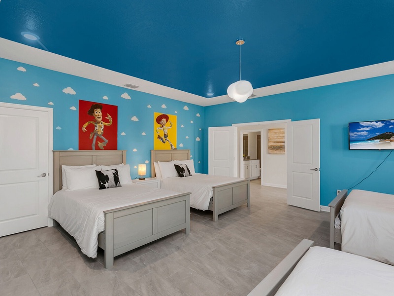 Each bedroom is equipped with its own TV, providing the perfect space to relax after a long day at the parks.