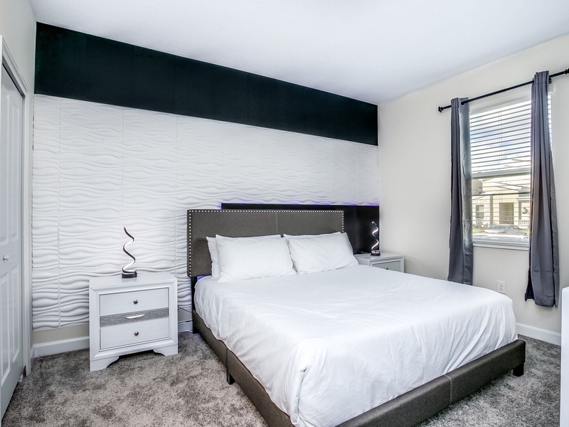 Each bedroom is equipped with its own TV, providing the perfect space to relax after a long day at the parks.