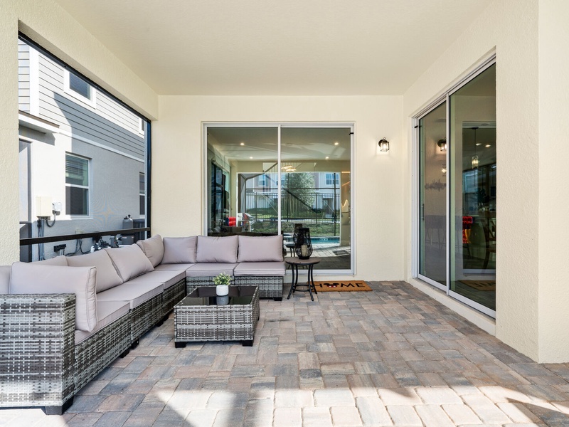 Unwind by the private pool at night in your cozy outdoor living room.