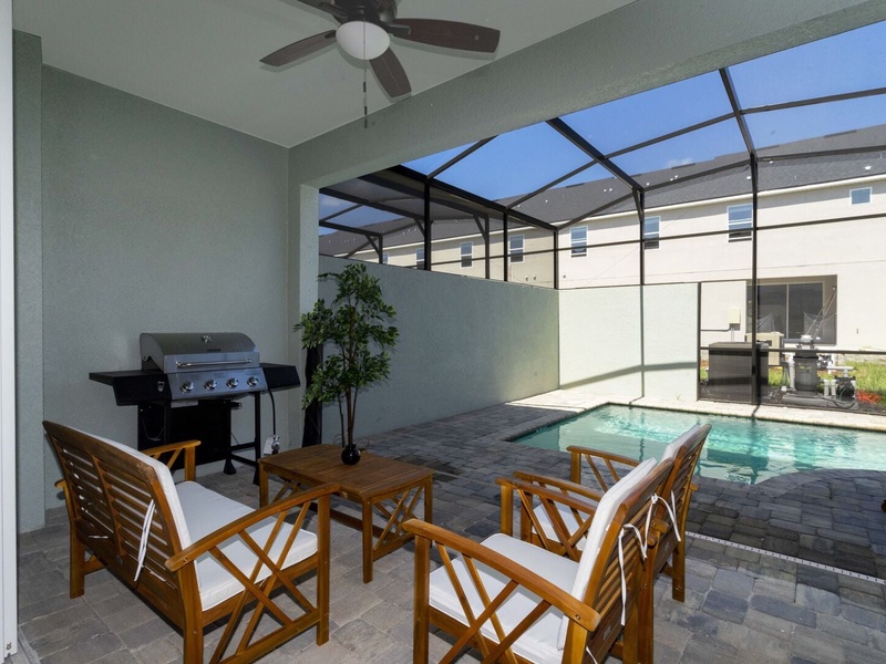 Have a relaxing evening in our outdoor dining space by the pool.
