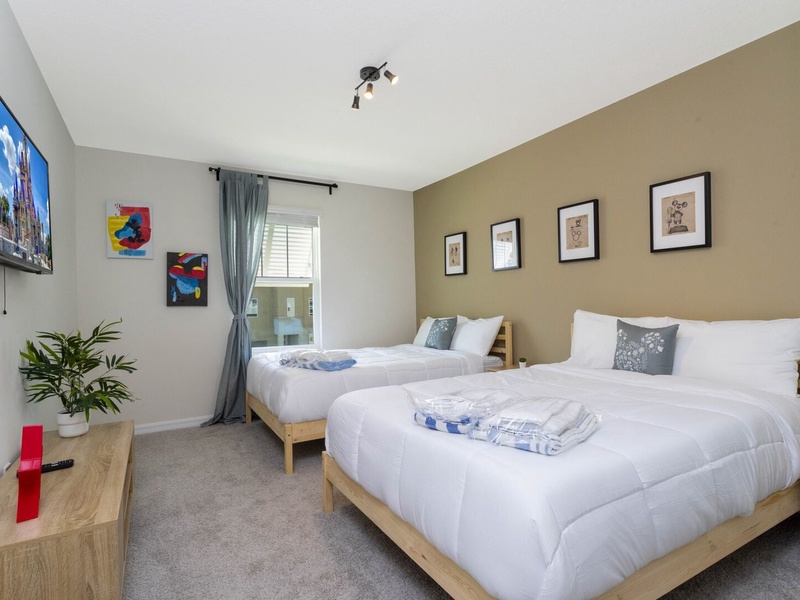Each bedroom comes with its own TV, perfect for relaxing after a long day at the parks.