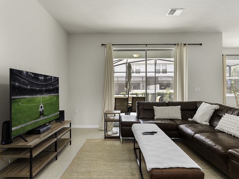 Enjoy a movie night in our living room with ample plush seating.