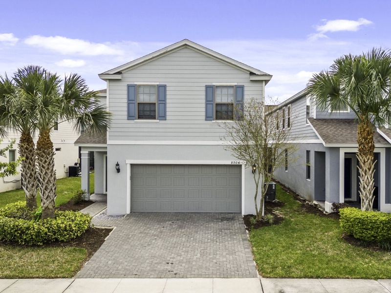 The driveway of the house features two parking spaces, providing convenient access for your vehicles. Guest parking spaces are also available.