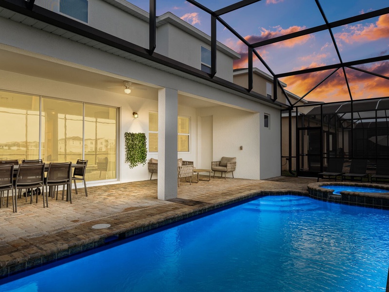 Enjoy lovely evenings outside by the private pool.
