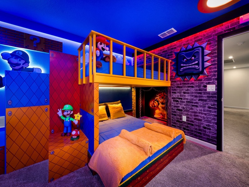 Looking for more adventure? This Mario Bros-themed room lets your little gamers dive into a colorful world of plenty of imagination!