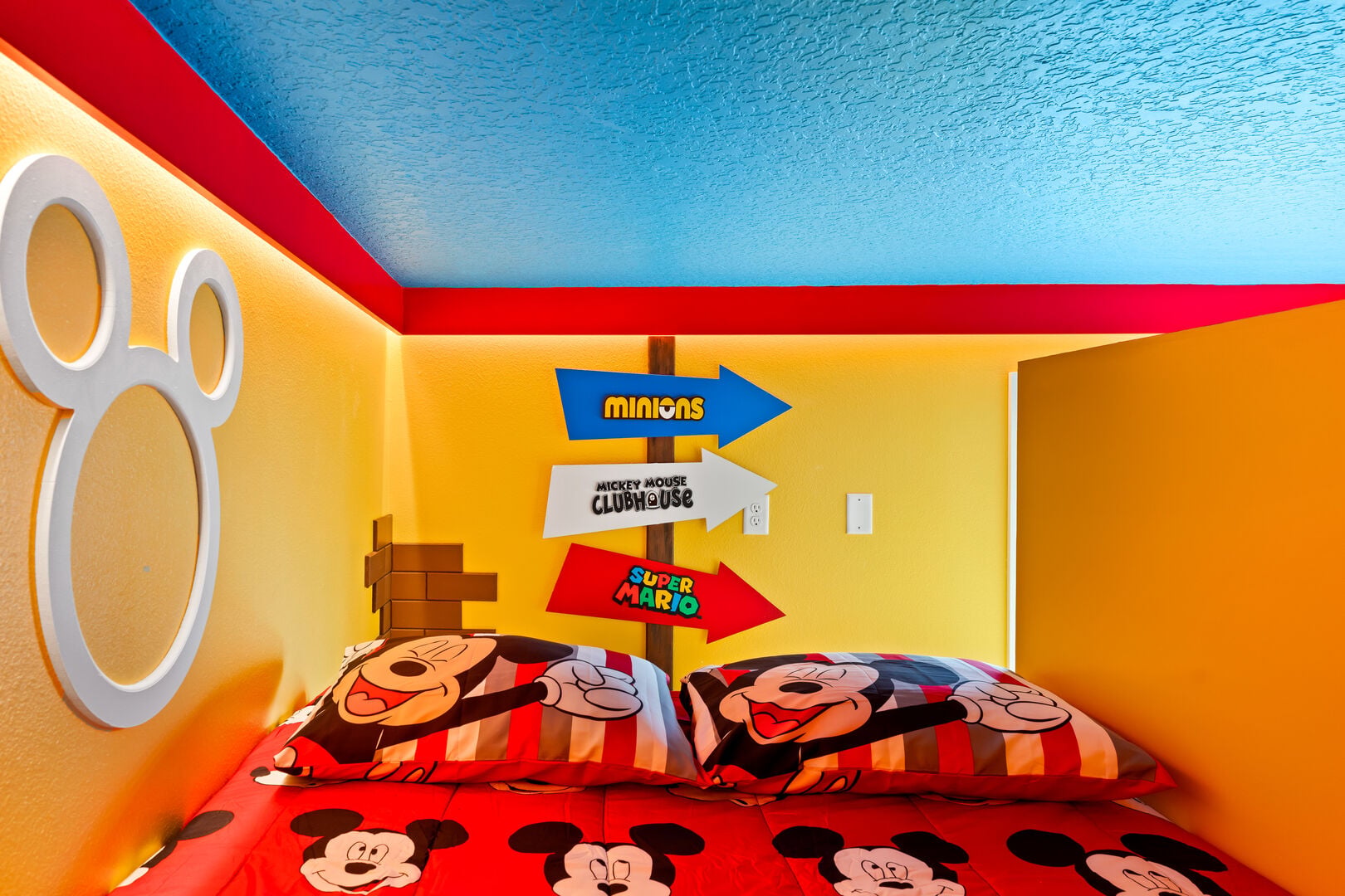The fun continues upstairs, slide from the bunk into a secret passage linking the Minions and Mario Bros rooms!