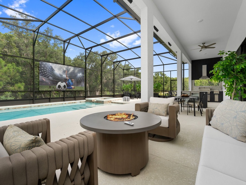 Enjoy our outdoor oasis featuring an alfresco dining area, outdoor kitchen with BBQ grill, cozy fire pit and private pool perfect for unforgettable evenings!
