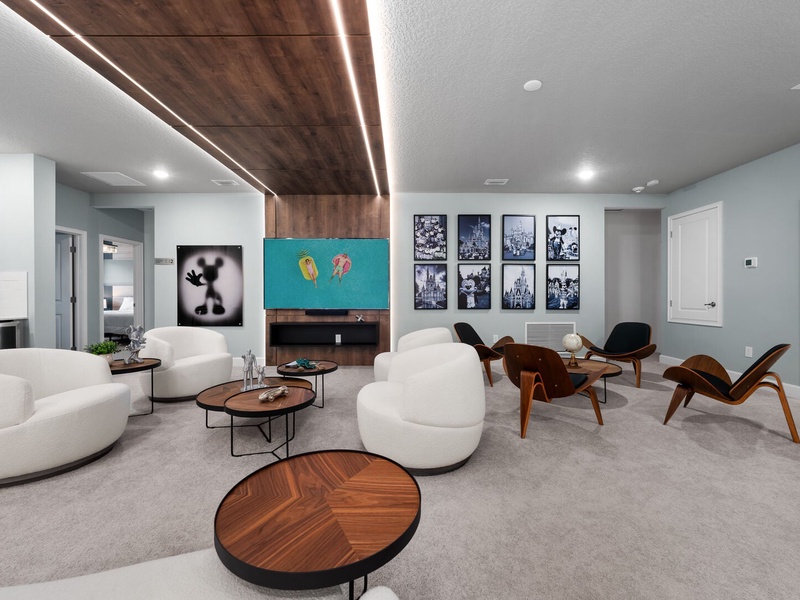 Our loft features a second TV room with a comfortable seating area and a mini bar area for your convenience and relaxation.