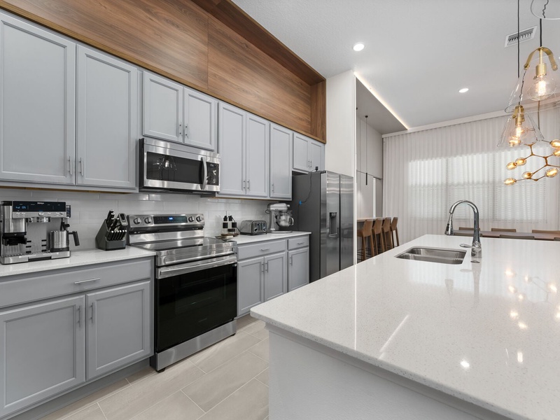 Our kitchen is fully equipped with stainless steel appliances with everything you need to get ready for the day.