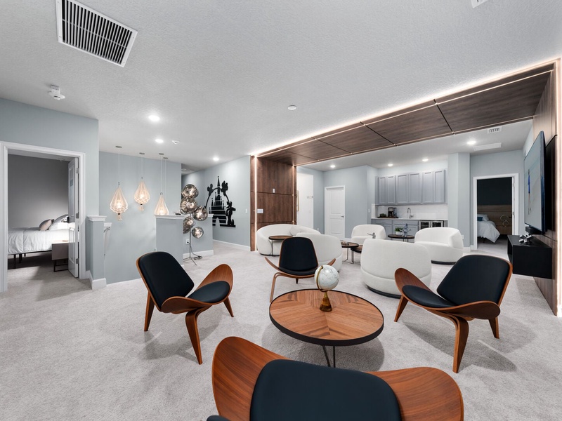 Our second TV room is the perfect space for relaxing movie nights, casual hangouts, or catching up on your favorite shows in a cozy and stylish setting.