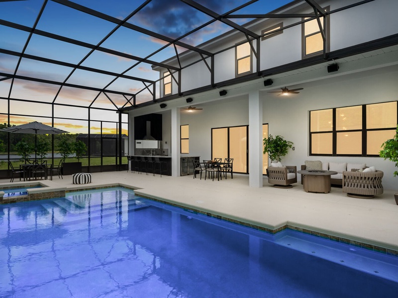 Enjoy lovely evenings outside by the private pool.
