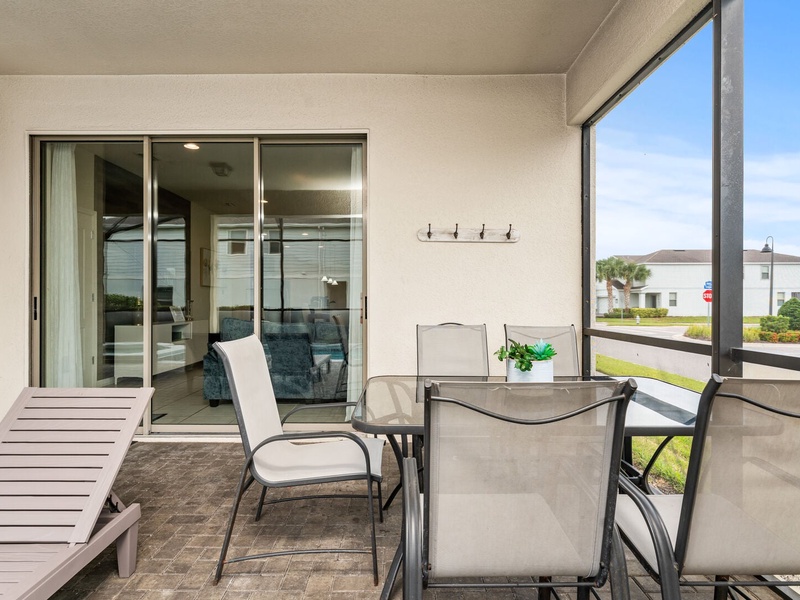 Our patio features a private pool, a BBQ grill, and a comfortable al fresco dining area to enjoy meals outdoors under the Florida sun.