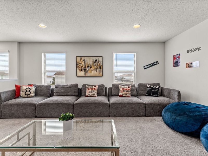 Enjoy cozy movie nights in our second TV room upstairs!