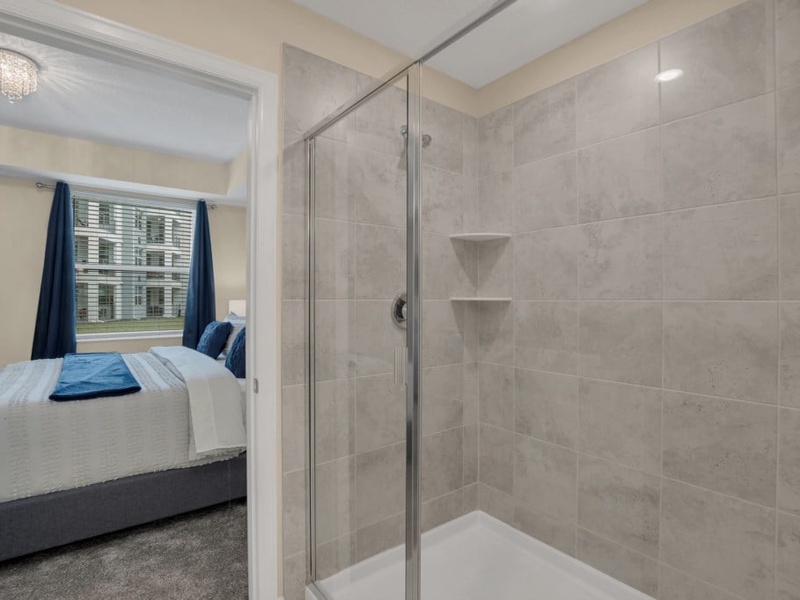 Master bathroom with double vanities and shower.