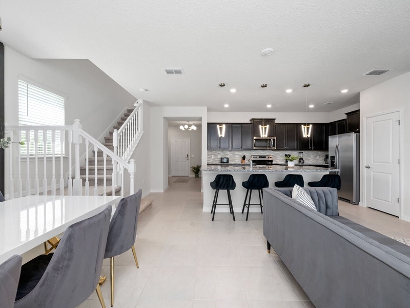 The house's open concept layout perfectly integrates the living room, dining room and kitchen with our outdoor space.
