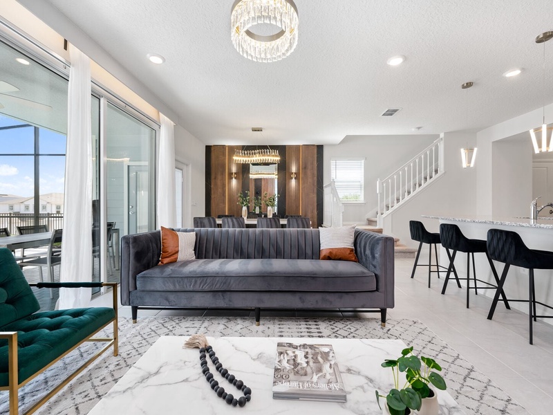 The house's open concept layout perfectly integrates the living room, dining room and kitchen with our outdoor space.