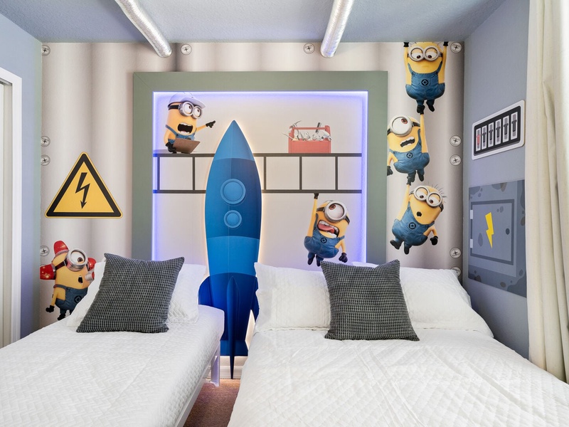 This room features one double bed and one twin bed.