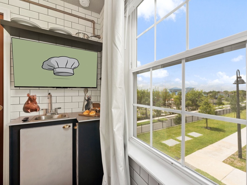 Each bedroom includes a TV, offering a private space to unwind after a day at the parks.