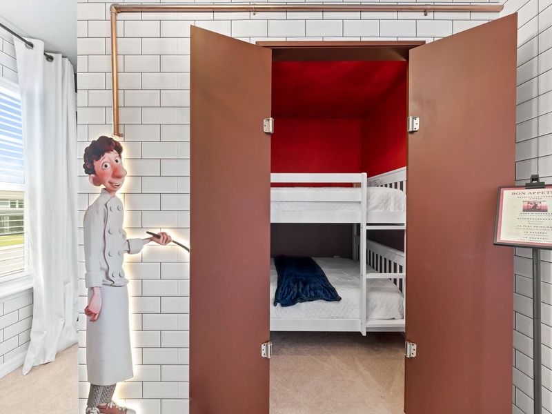 This room features a bunk bed with double beds on each level.