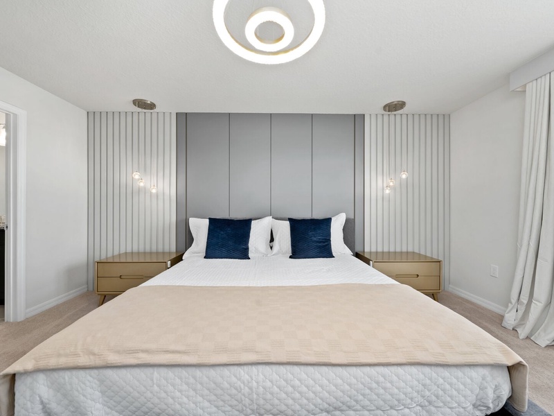 Our master bedroom features a king size bed and its own private bathroom.