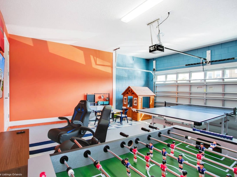In need of more entertainment? The house also features a game room with a foosball table, ping-pong and game console.