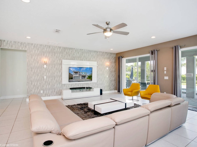 Enjoy a movie night in our living room with ample plush seating.