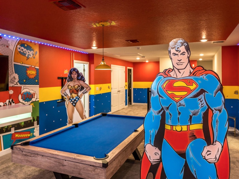 Justice League making sure you're having a great time in the game room!