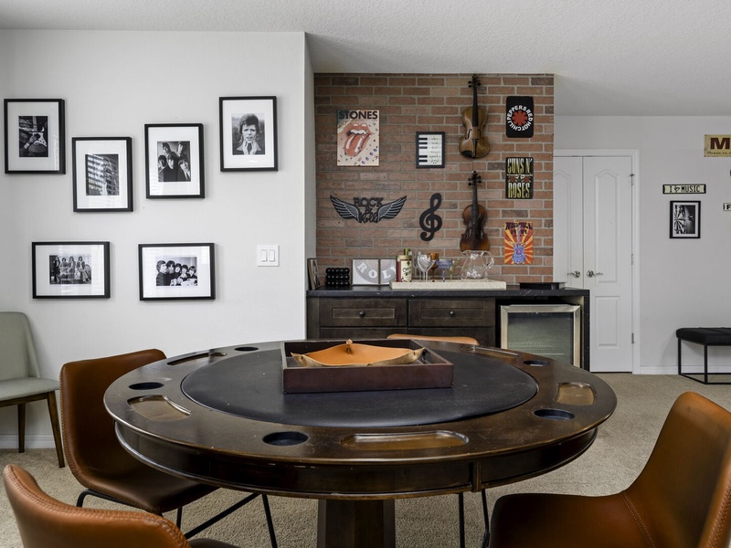 A pocket table and a mini bar is available for game nights.