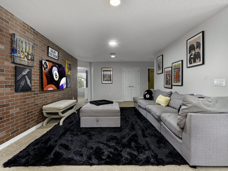 Ample plush seating for a cozy movie night.