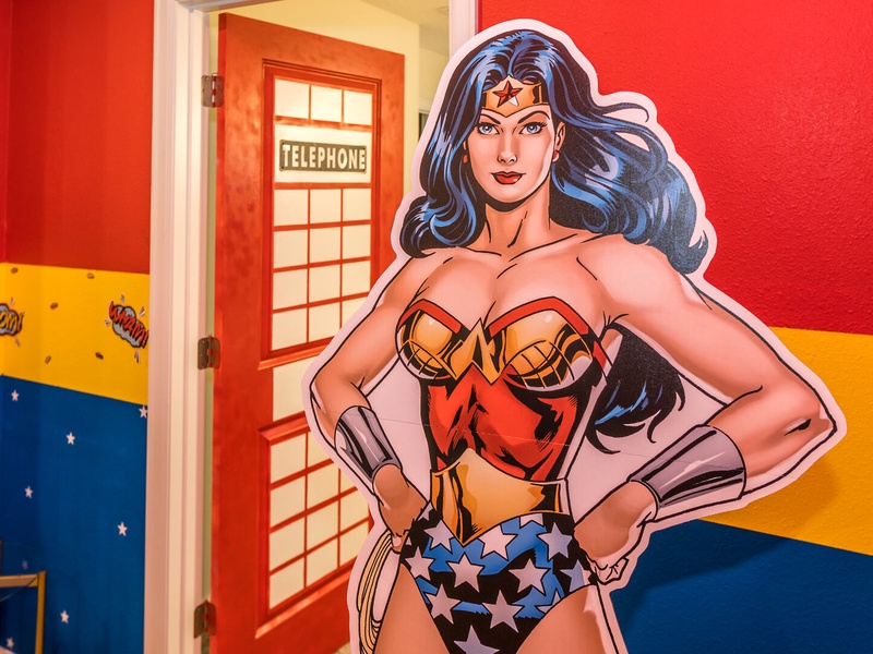 Justice League making sure you're having a great time in the game room!