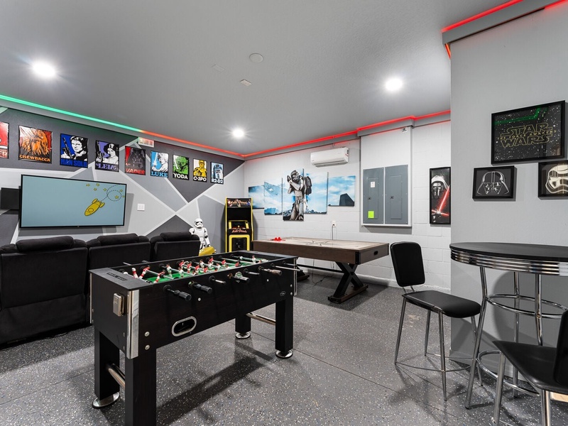 In need of more entertainment? The house also features a Star Wars-themed game room!
