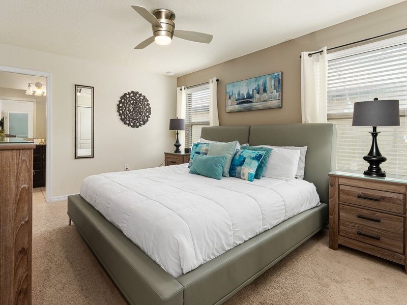Third bedroom on the second floor features a king size bed and a private bathroom.