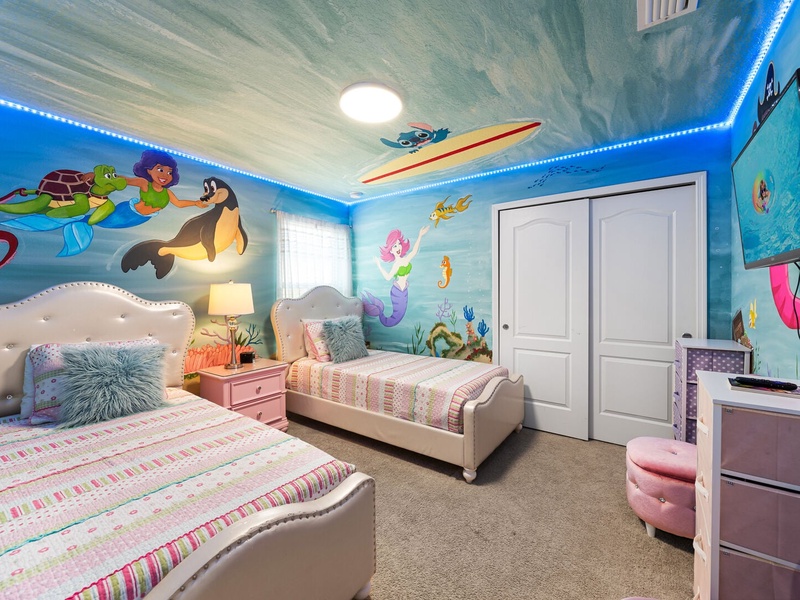 Love life under the sea? Your little ones will adore this enchanting Little Mermaid-themed room.