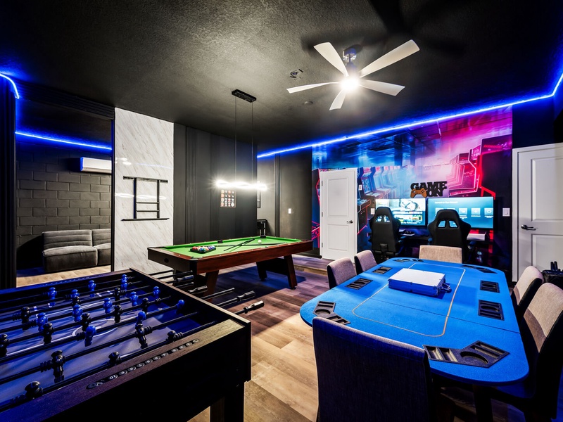 Viva las Vegas! Our Vegas-style game room features a game console, pool table, foosball table, and its own mini theater room.