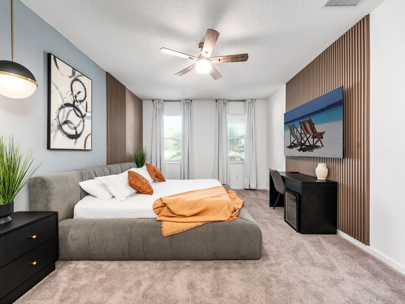 Each bedroom features comfortably appointed beds, a work desk, TV, and a private ensuite bathroom.