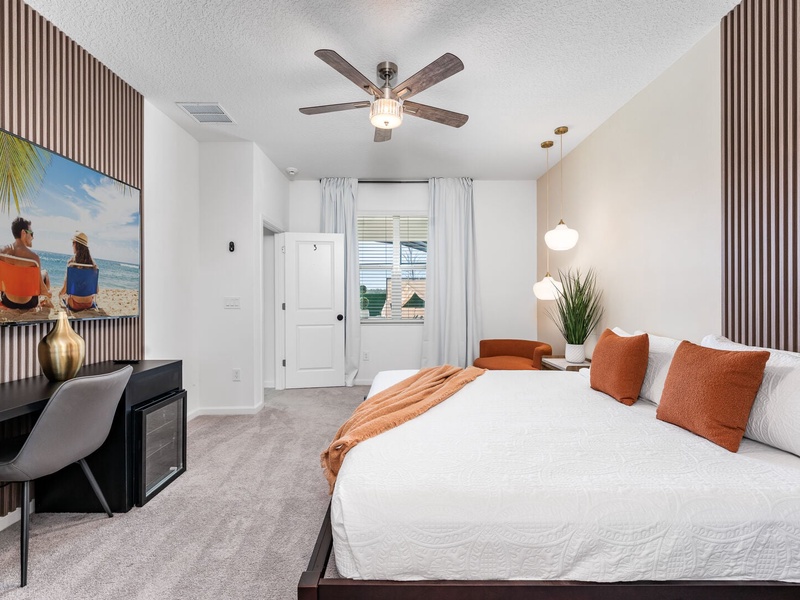 Each bedroom features comfortably appointed beds, a work desk, TV, and a private ensuite bathroom.