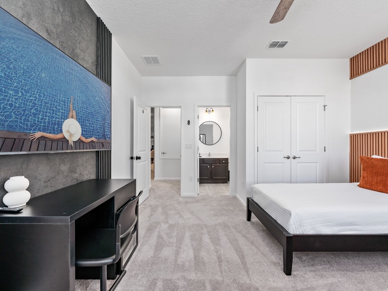 Each bedroom features comfortably appointed beds, a work desk, TV, and a private ensuite bathroom.