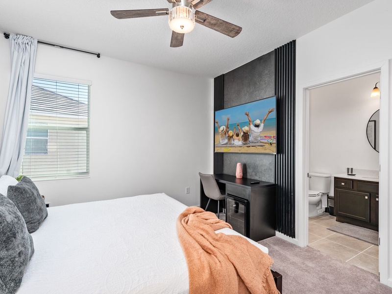 Each bedroom features comfortably appointed beds, a work desk, TV, and a private ensuite bathroom.