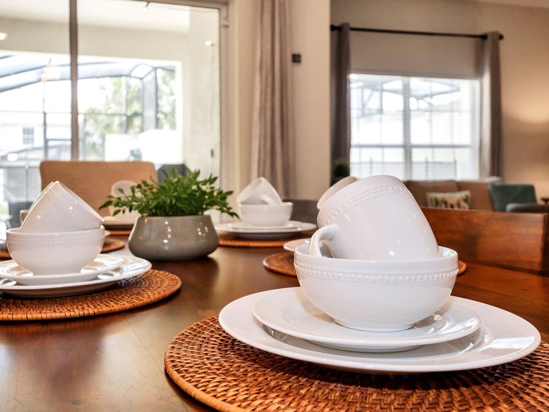 The dining area and kitchen comes with all the cooking and dining essentials you'll need.