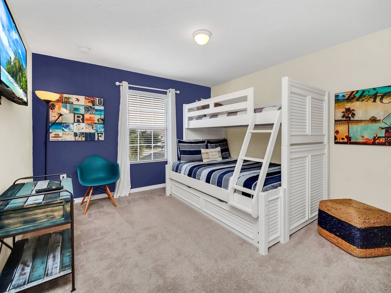 Our last guestroom features a bunk bed, as well as a pull out bed from underneath.