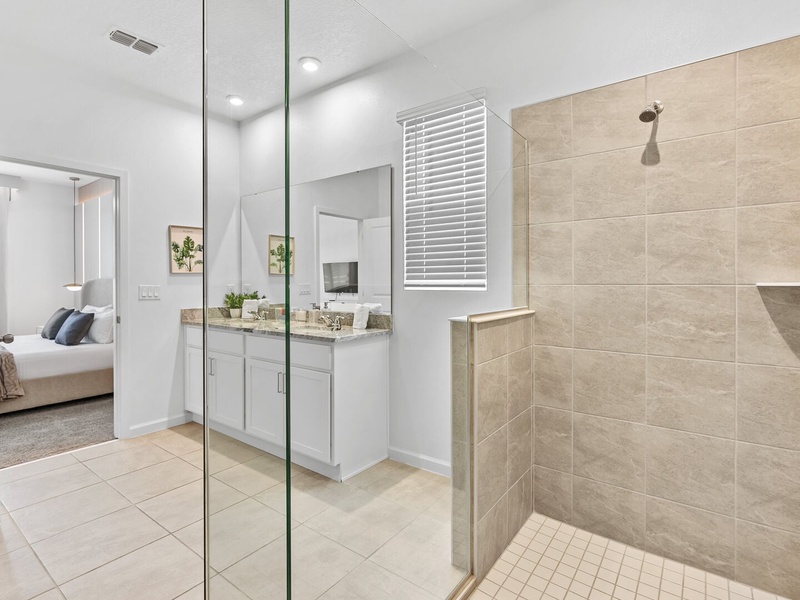 Walk-in shower in a modern bathroom.