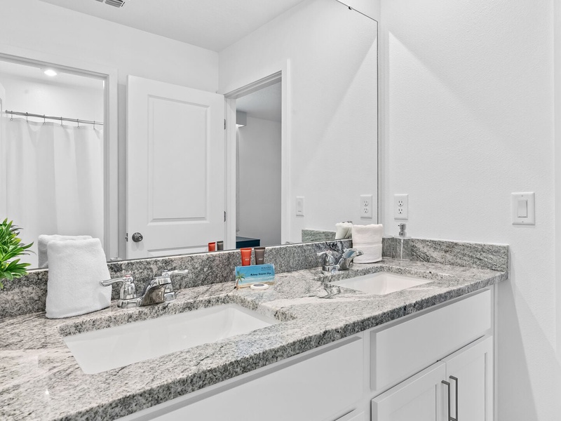 Convenient Jack and Jill bathroom connecting two bedrooms.